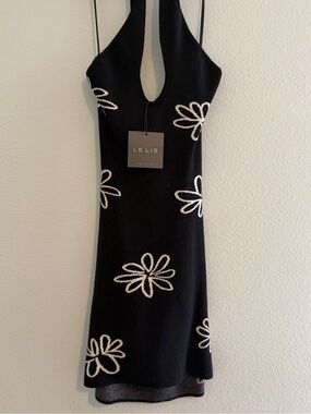 Le Lis Black One-Shoulder Knit Dress with White Daisy Detail